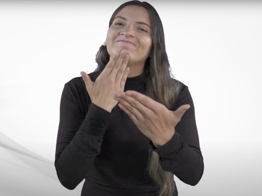 Mujer usando lengua de señas colombiana