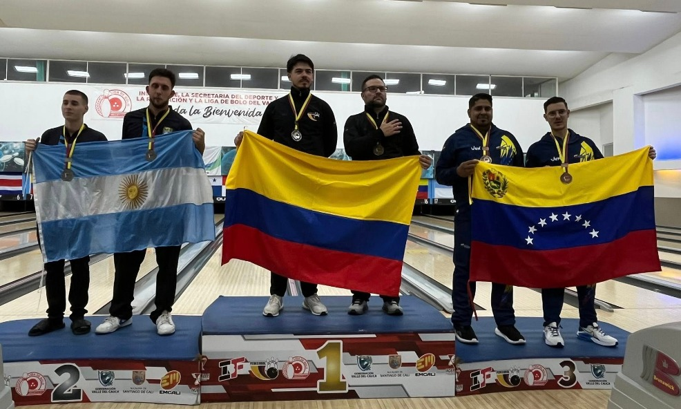 Alfredo Quintana y Manuel Otálora (al centro)