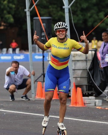 Gabriela Rueda al momento de cruzar la meta y ganar la única medalla que le faltaba. Foto cortesía COC. 