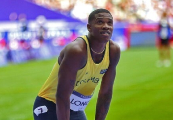 Ronal Longa, del Equipo Bogotá, marca suramericana en 100 metros y cupo al Mundial de Tokio. Foto COC-Runningcoloia. IDRD. 